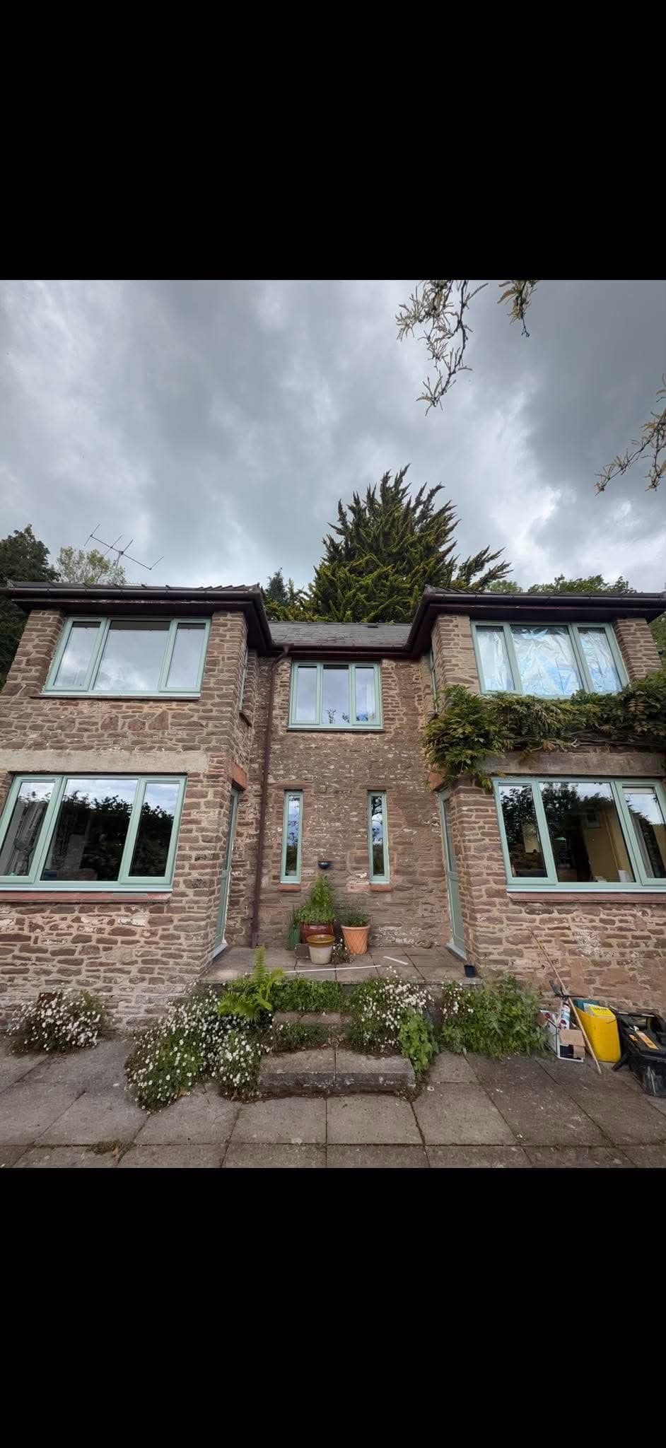 uPVC windows installed on a stone home by OGW